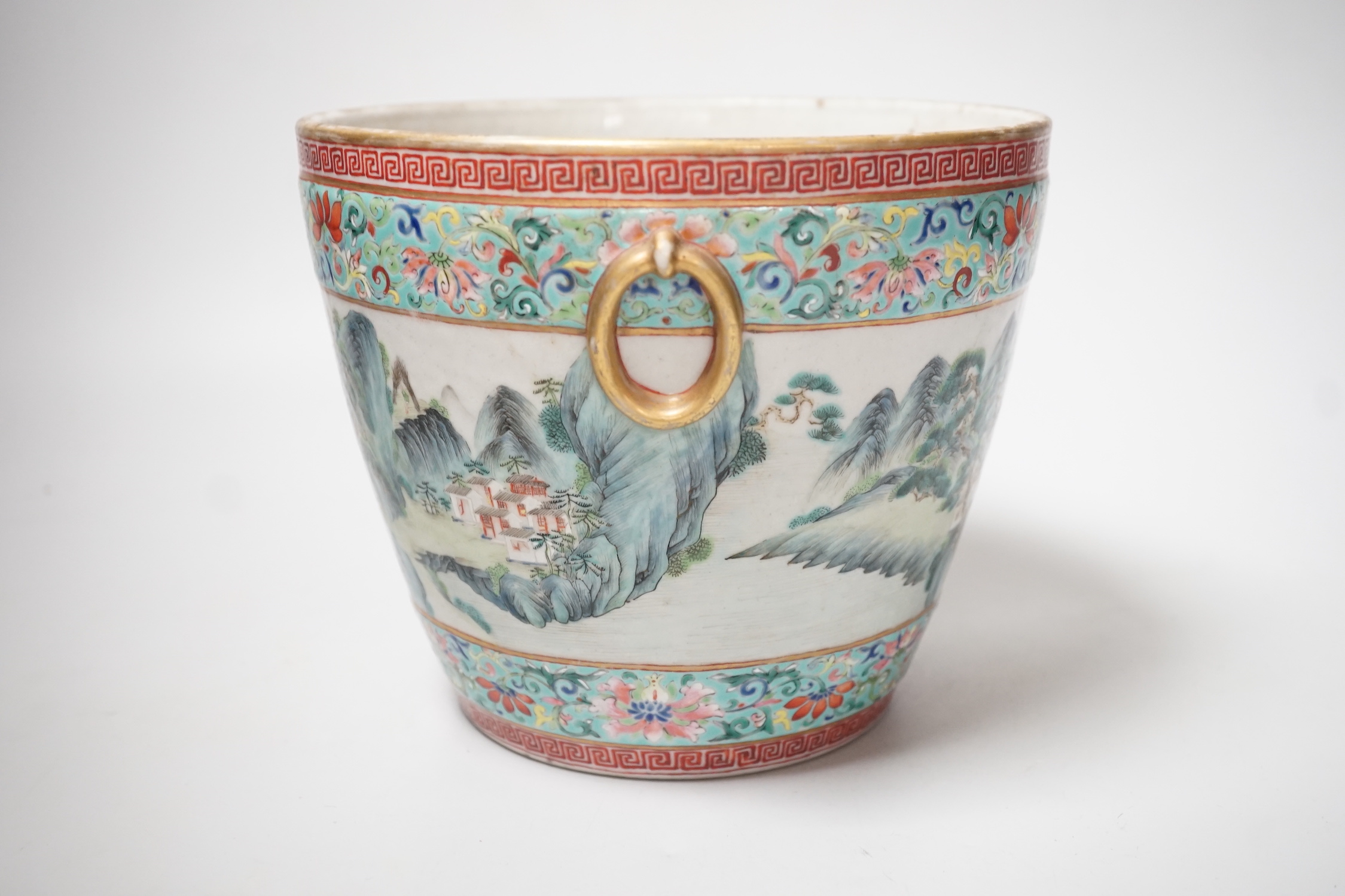 A 19th century Chinese famille rose ‘landscape’ planter, 15cm tall, rim crack